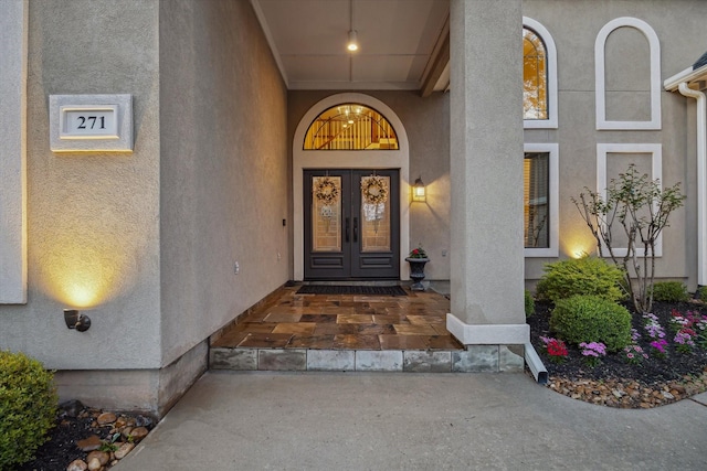 271 W Pines Dr, Montgomery, TX 77356 - doorway to property featuring french doors and stucco siding