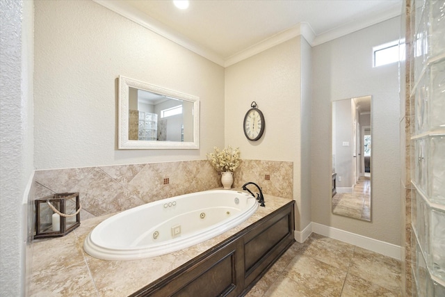 271 W Pines Dr, Montgomery, TX 77356 - bathroom with ornamental molding, a whirlpool tub, and baseboards