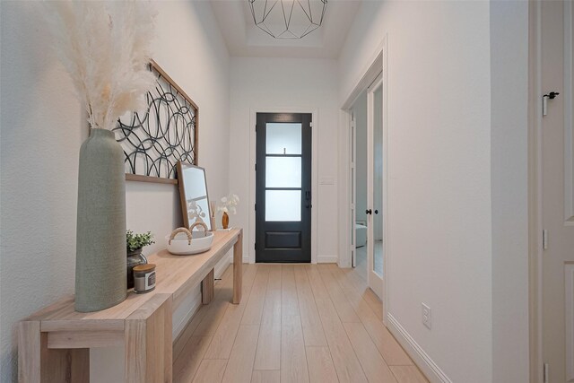 9603 Crescent Mill Dr, Missouri City, TX 77459 - foyer entrance featuring light wood-style flooring and baseboards