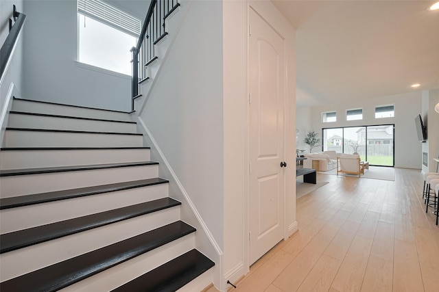 9603 Crescent Mill Dr, Missouri City, TX 77459 - stairs featuring recessed lighting and wood finished floors