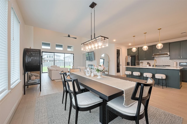 9603 Crescent Mill Dr, Missouri City, TX 77459 - dining area featuring recessed lighting, light wood-style flooring, baseboards, and ceiling fan