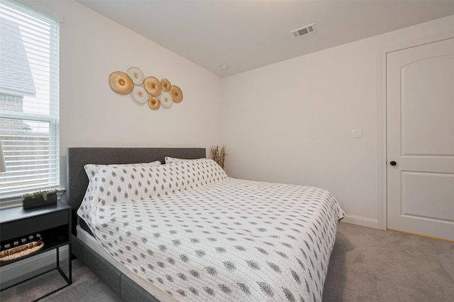 9603 Crescent Mill Dr, Missouri City, TX 77459 - carpeted bedroom featuring baseboards and visible vents