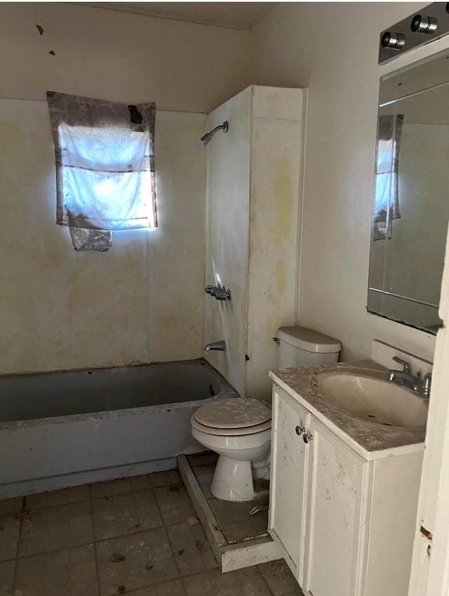 7314 Texas St, Houston, TX 77011 - bathroom featuring vanity, toilet, bathtub / shower combination, and tile patterned floors
