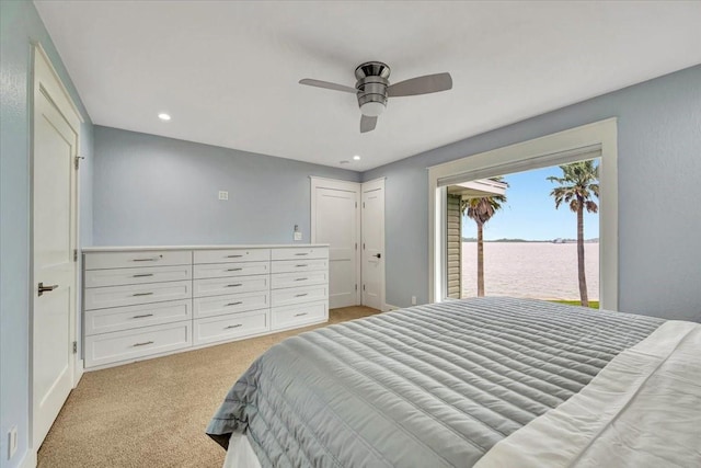 126 Tamana Dr, Tiki Island, TX 77554 - bedroom with recessed lighting, baseboards, light colored carpet, and ceiling fan