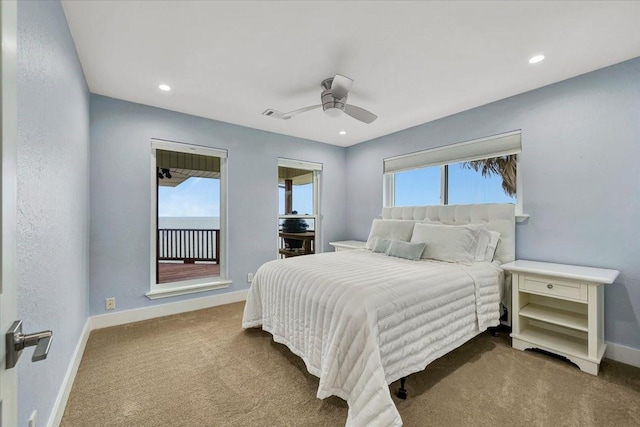 126 Tamana Dr, Tiki Island, TX 77554 - bedroom featuring baseboards, ceiling fan, visible vents, and carpet