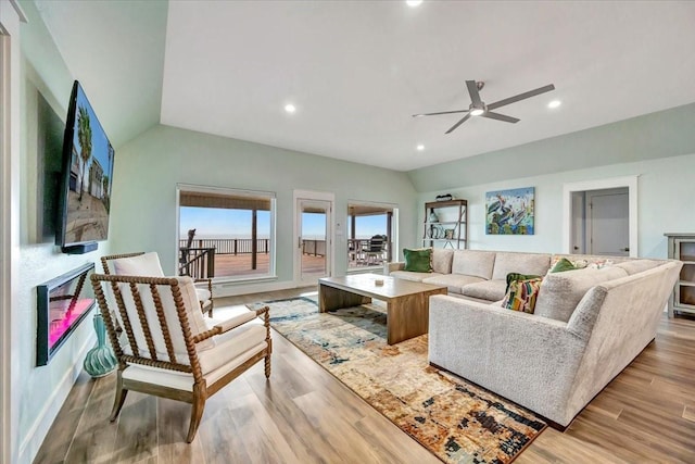126 Tamana Dr, Tiki Island, TX 77554 - living area with lofted ceiling, wood finished floors, ceiling fan, and recessed lighting