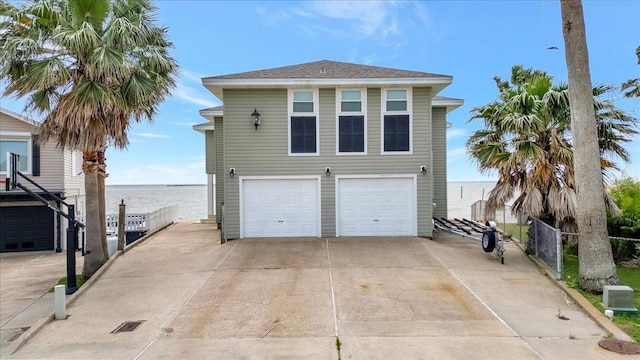 126 Tamana Dr, Tiki Island, TX 77554 - exterior space featuring driveway and fence