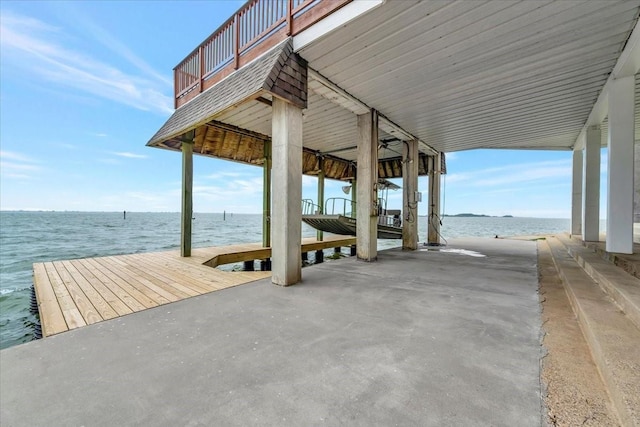 126 Tamana Dr, Tiki Island, TX 77554 - dock area with a water view and boat lift