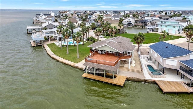 126 Tamana Dr, Tiki Island, TX 77554 - bird's eye view featuring a residential view and a water view
