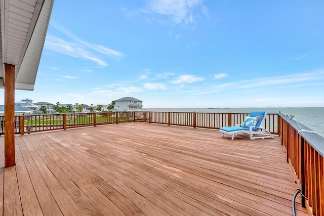 126 Tamana Dr, Tiki Island, TX 77554 - wooden terrace with a water view