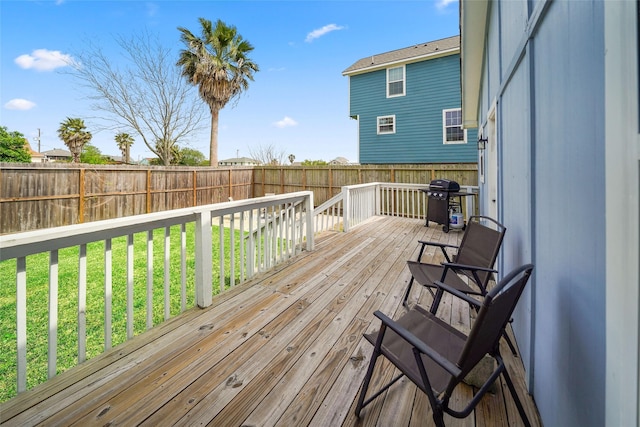 2008 71st St, Galveston, TX 77551 - wooden terrace featuring a grill