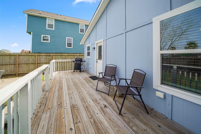 2008 71st St, Galveston, TX 77551 - wooden deck featuring area for grilling