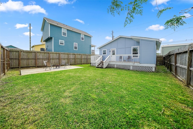 2008 71st St, Galveston, TX 77551 - back of house with a deck and a patio