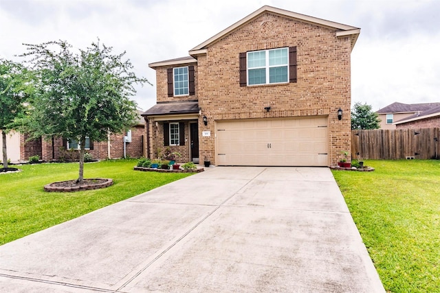 traditional home with driveway, a front yard, fence, and brick siding