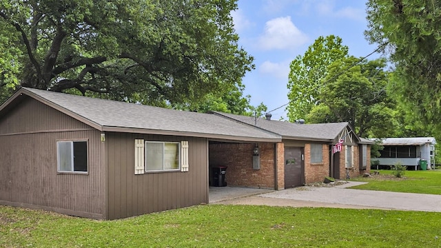 2509 Bayou Ave, Baytown, TX 77520 - view of side of property with a lawn and roof with shingles