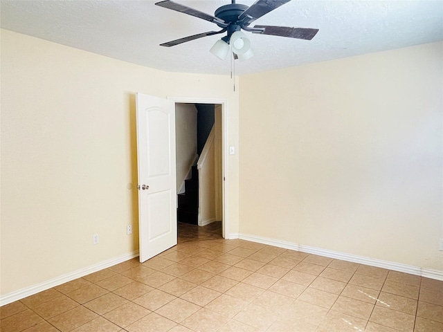 2503 Radcliffe Dr, Sugar Land, TX 77498 - unfurnished room featuring ceiling fan and light tile patterned floors