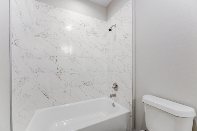 full bathroom with toilet and bathing tub / shower combination