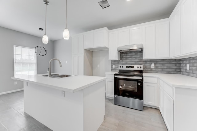 kitchen featuring decorative backsplash, stainless steel range with electric stovetop, white cabinets, under cabinet range hood, and a sink