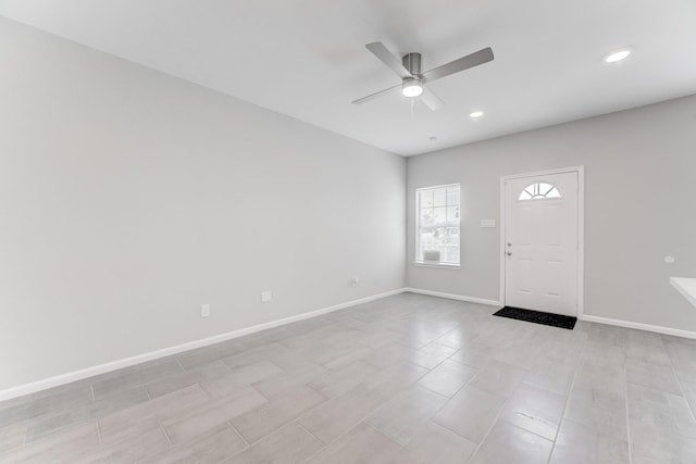entryway with a ceiling fan, baseboards, and recessed lighting