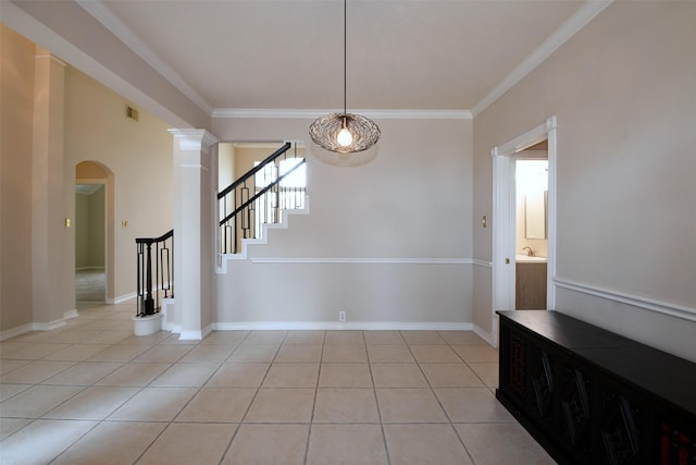 18719 Racquet Sports Way, Humble, TX 77346 - empty room with light tile patterned floors, crown molding, stairs, arched walkways, and baseboards