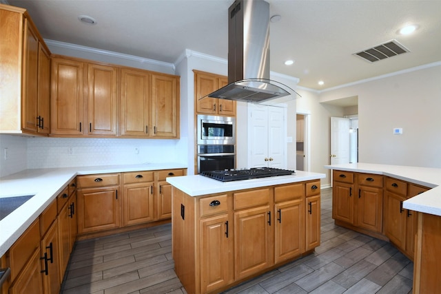 18719 Racquet Sports Way, Humble, TX 77346 - kitchen with appliances with stainless steel finishes, island range hood, crown molding, wood tiled floors, and a center island
