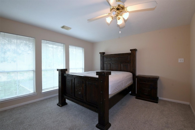 18719 Racquet Sports Way, Humble, TX 77346 - bedroom with carpet flooring, baseboards, and ceiling fan
