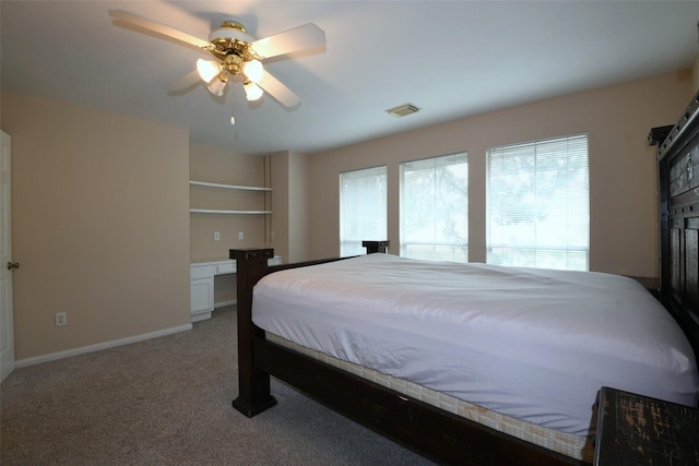 18719 Racquet Sports Way, Humble, TX 77346 - bedroom with multiple windows, light carpet, ceiling fan, and baseboards