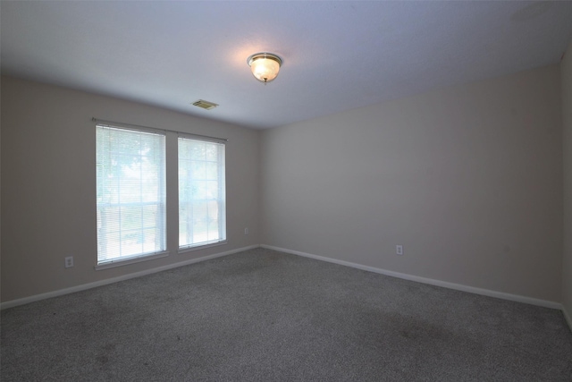 18719 Racquet Sports Way, Humble, TX 77346 - spare room featuring carpet and baseboards