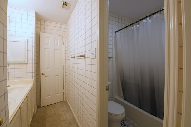 18719 Racquet Sports Way, Humble, TX 77346 - full bathroom with tile walls, vanity, shower / tub combo, and toilet