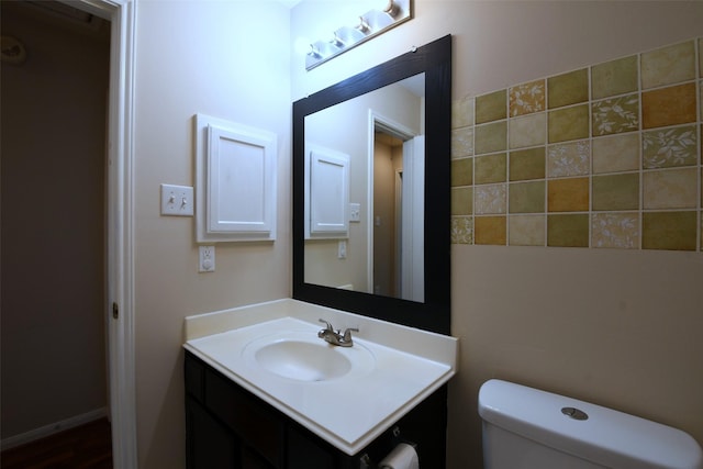 18719 Racquet Sports Way, Humble, TX 77346 - half bathroom featuring vanity and toilet
