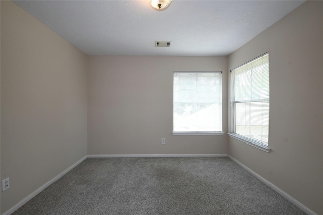 18719 Racquet Sports Way, Humble, TX 77346 - empty room featuring carpet and baseboards