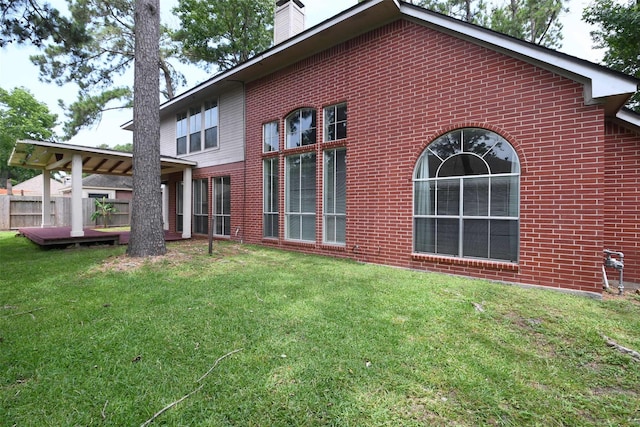 18719 Racquet Sports Way, Humble, TX 77346 - rear view of property with brick siding and a chimney