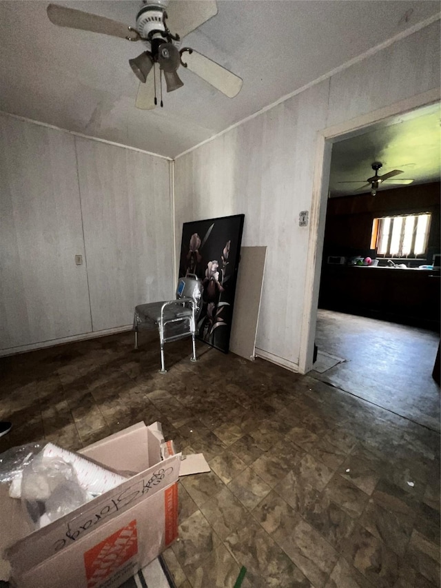 living room featuring ceiling fan