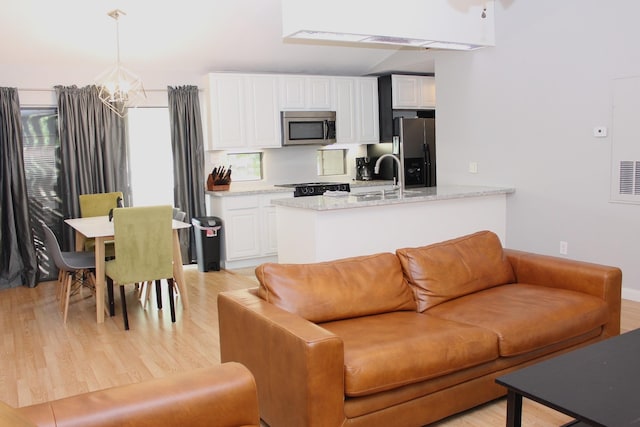 living area featuring light wood-type flooring