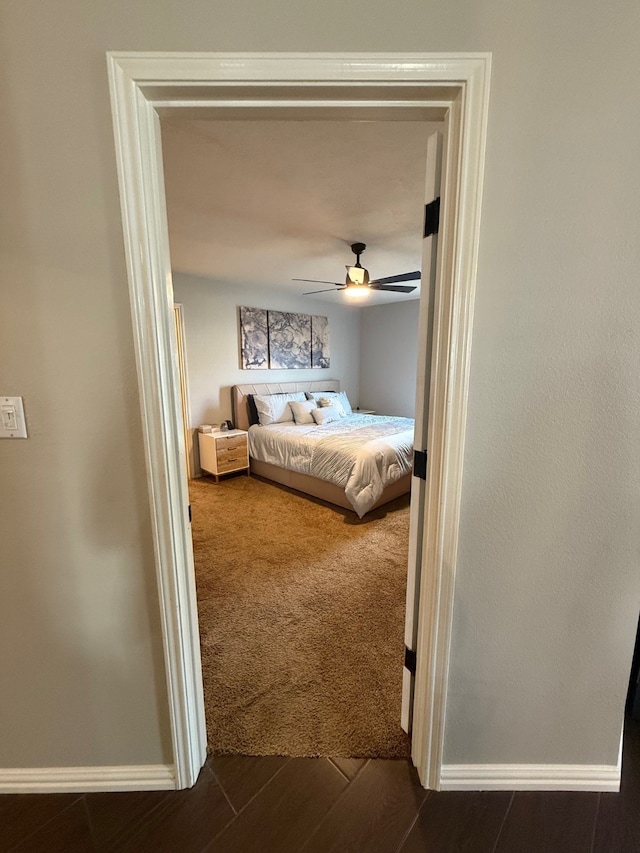 9319 Dalmore Ct, Houston, TX 77095 - bedroom featuring baseboards, ceiling fan, and dark colored carpet