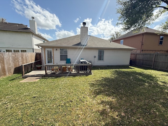 9319 Dalmore Ct, Houston, TX 77095 - back of house featuring a fenced backyard, a deck, and a yard