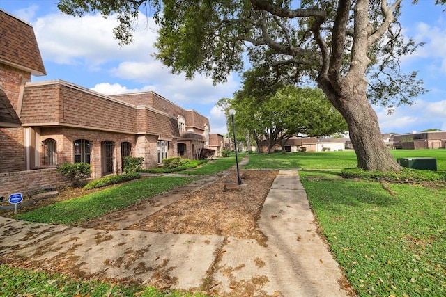 2825 Camelot Ln, Missouri City, TX 77459 - exterior space with a lawn