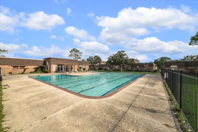 2825 Camelot Ln, Missouri City, TX 77459 - community pool featuring fence and a patio area
