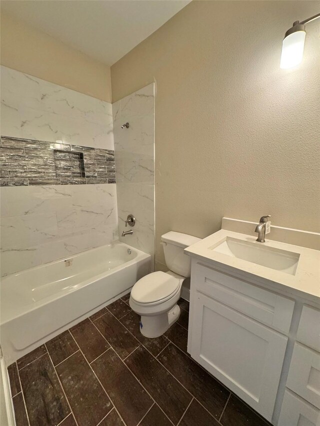 9830 Turnbow St, Houston, TX 77029 - full bathroom featuring toilet, vanity, and shower / bath combination