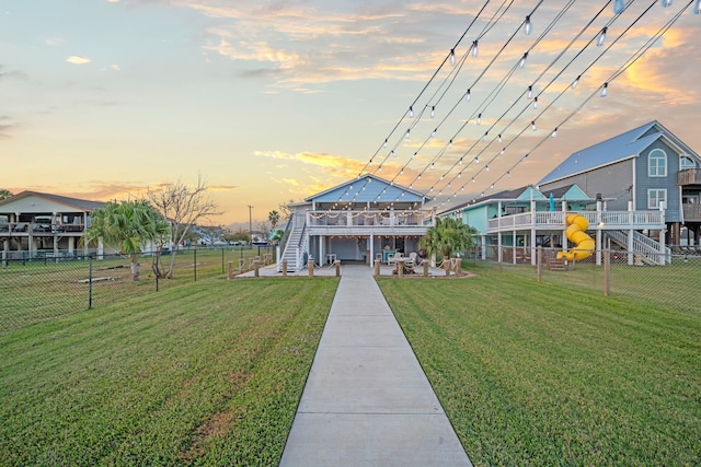 1407 John St, San Leon, TX 77539 - dock with stairs, a wooden deck, and a patio