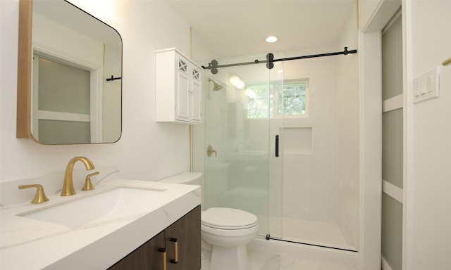 full bathroom featuring recessed lighting, marble finish floor, toilet, vanity, and a stall shower