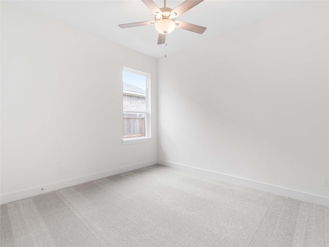 7517 Hawk Crest Dr, Fulshear, TX 77441 - empty room with light colored carpet and a ceiling fan