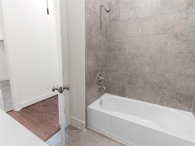 7517 Hawk Crest Dr, Fulshear, TX 77441 - full bath with bathtub / shower combination and baseboards
