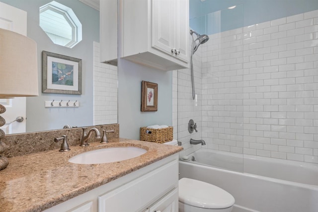 full bathroom with toilet, vanity, and shower / tub combination