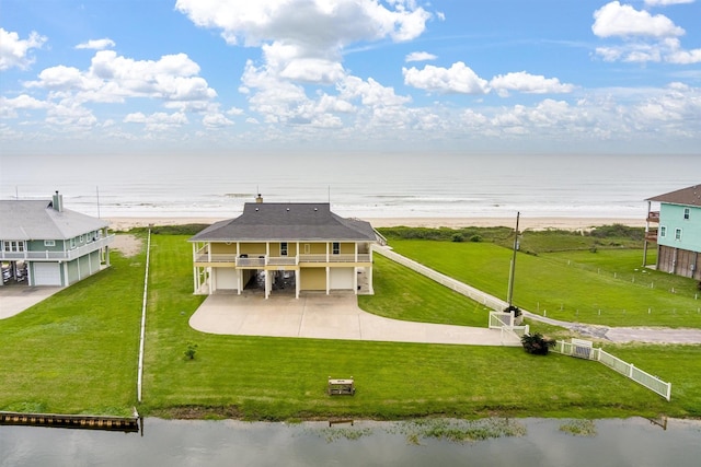 bird's eye view featuring a view of the beach and a water view