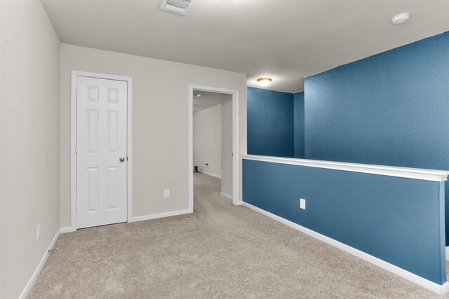 165 Camelot Place Ct, Conroe, TX 77304 - carpeted spare room featuring a smoke detector and baseboards