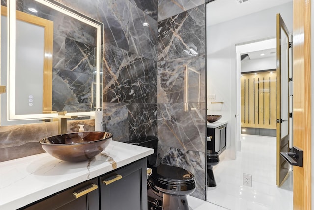 3902 Charleston St, Houston, TX 77021 - bathroom featuring vanity and tasteful backsplash