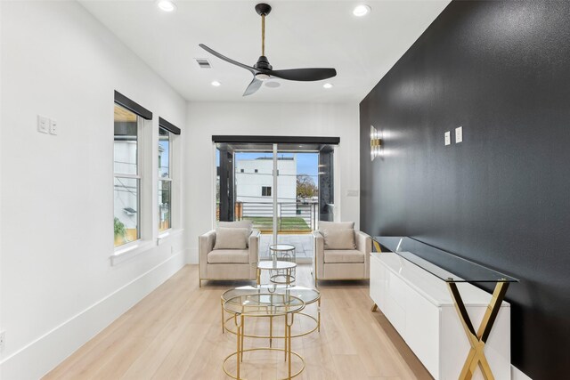 3902 Charleston St, Houston, TX 77021 - living area with light wood-type flooring, a ceiling fan, and recessed lighting