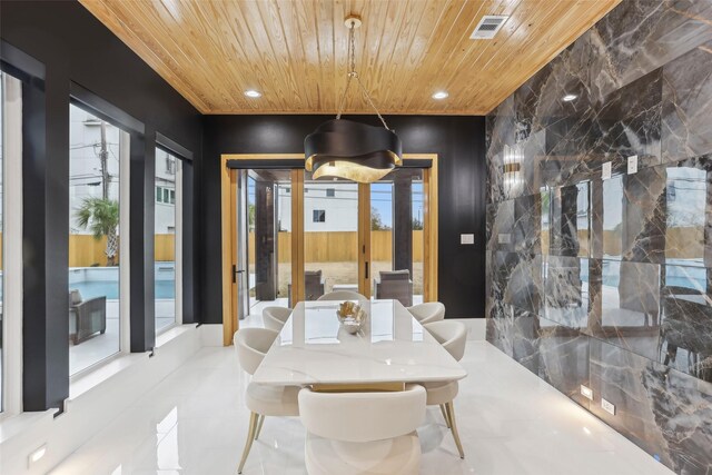 3902 Charleston St, Houston, TX 77021 - dining space featuring wooden ceiling, recessed lighting, plenty of natural light, and french doors