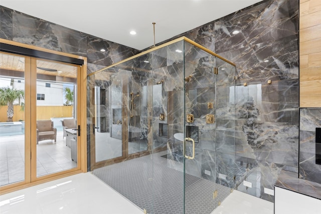 3902 Charleston St, Houston, TX 77021 - full bath with a marble finish shower, tile patterned floors, and recessed lighting